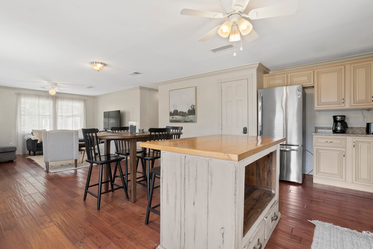 Spacious kitchen island with full-size refrigerator